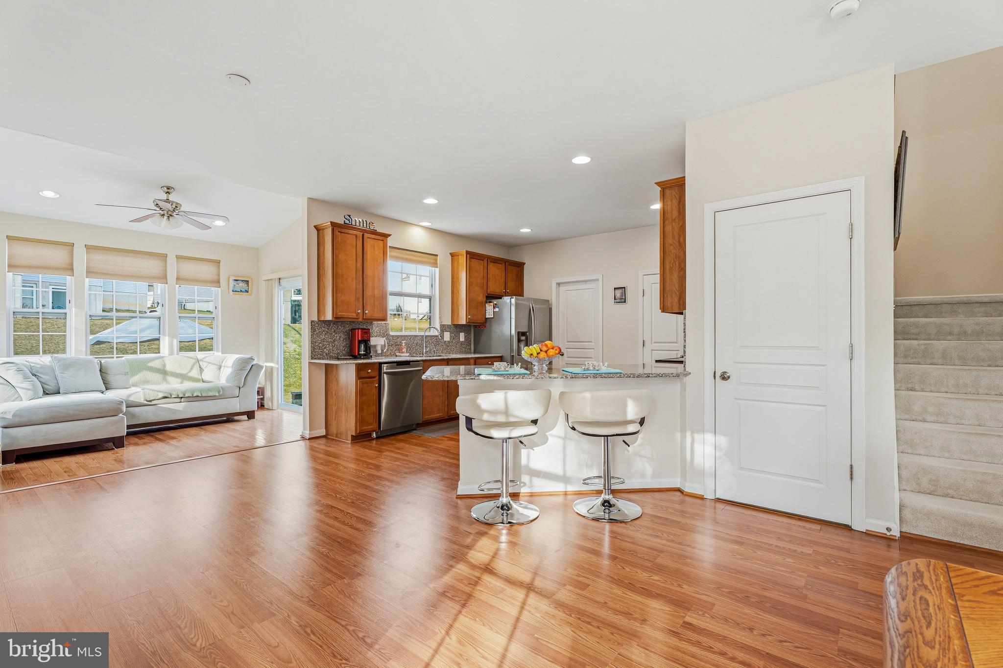 8876 Paddock Lane Baltimore, MD 21234 - Photo 7 of 37 a living room with furniture and a large window