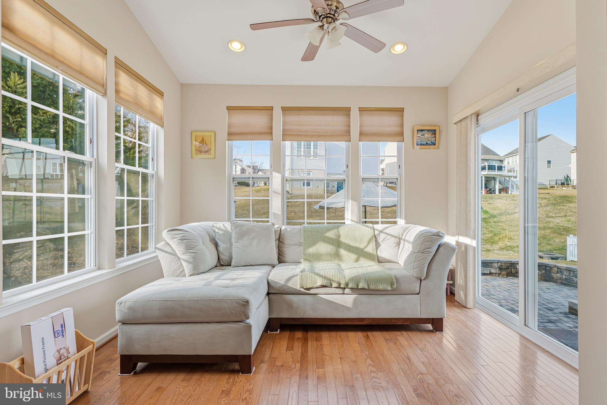 8876 Paddock Lane Baltimore, MD 21234 - Photo 10 of 37 a living room with furniture and a large window