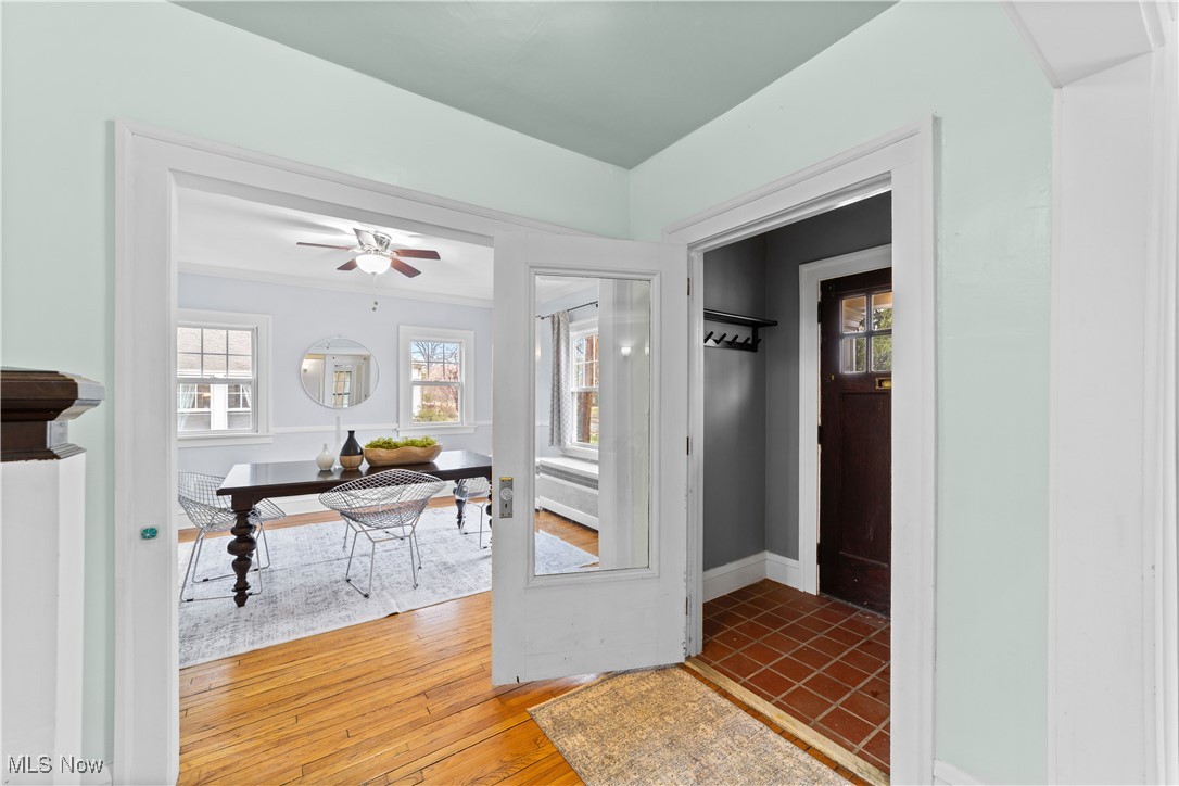 2891 Huntington Road Cleveland, OH 44120 - Photo 6 of 44 Hallway featuring light wood-style flooring and baseboards