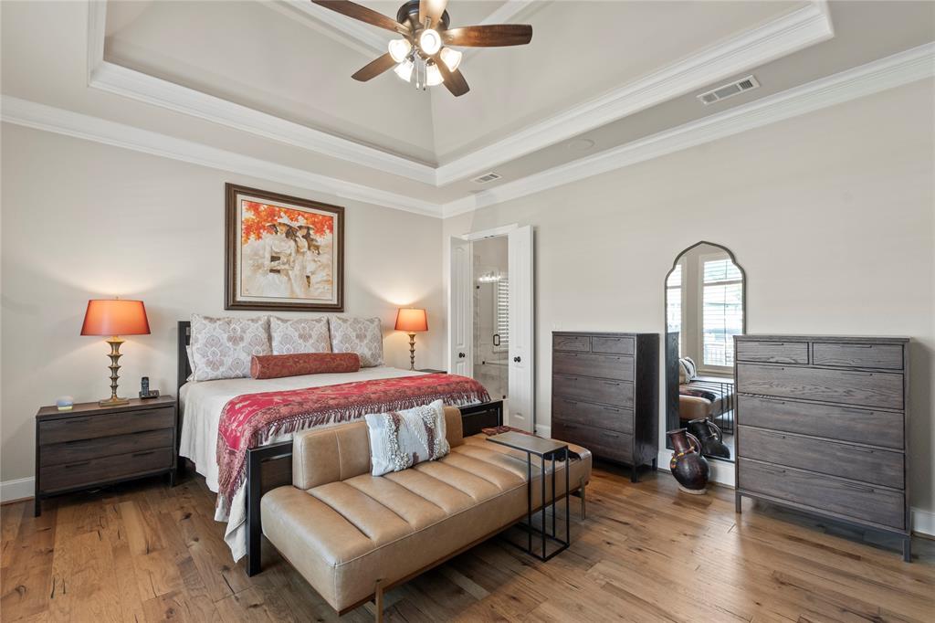 111 St Annes Mabank, TX 75156 - Photo 11 of 40 a bedroom with a bed and wooden floor