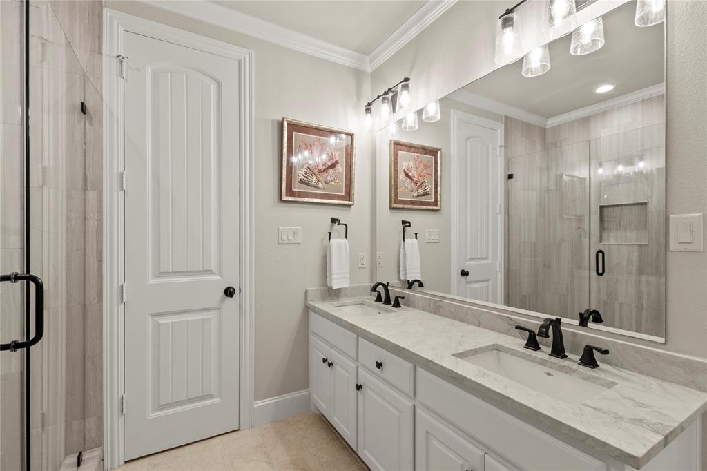 111 St Annes Mabank, TX 75156 - Photo 19 of 40 a bathroom with double sink and a mirror