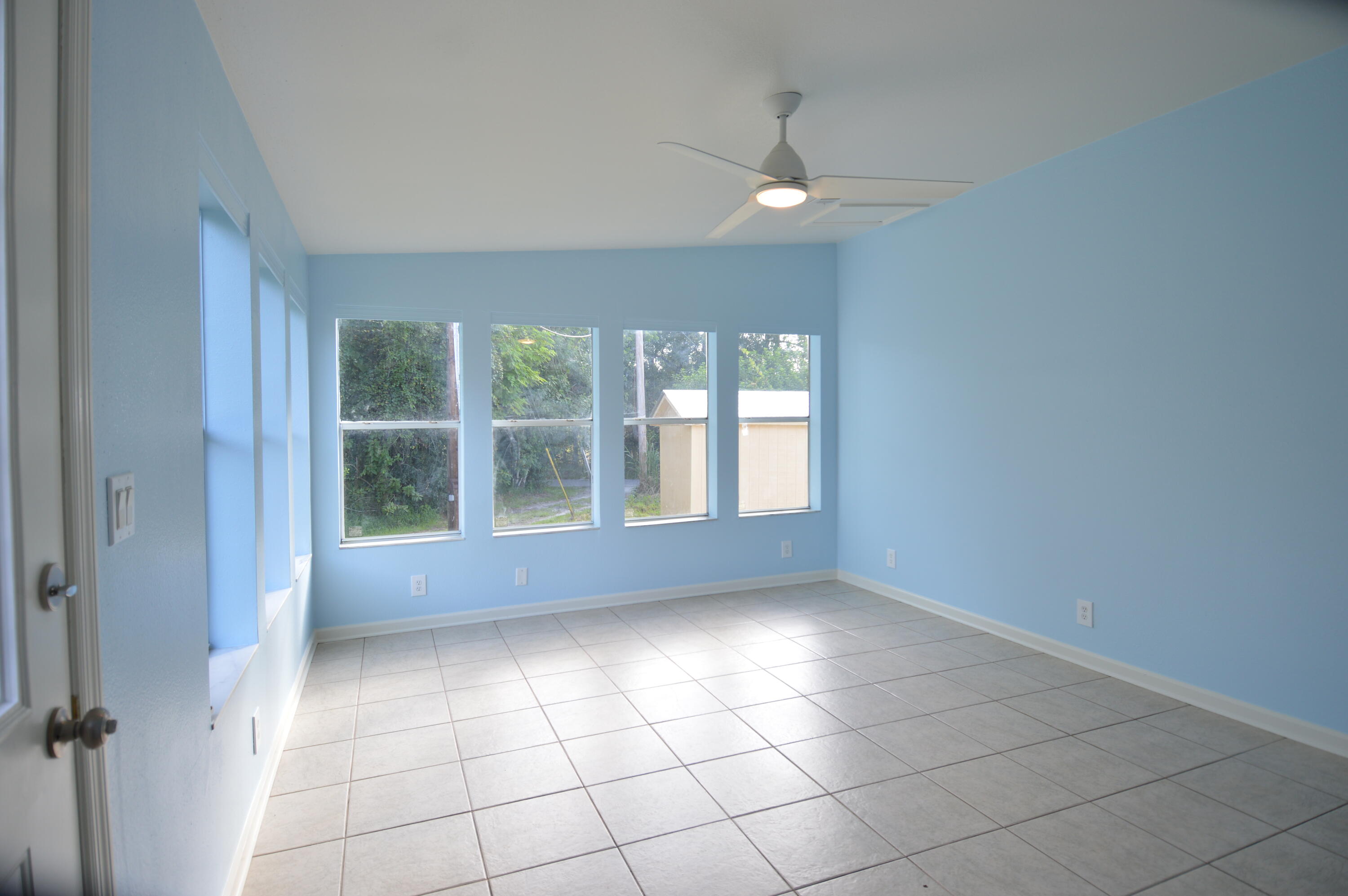 1201 Southwest Sunshine Street Stuart, FL 34997 - Photo 24 of 41 a view of an empty room with a window