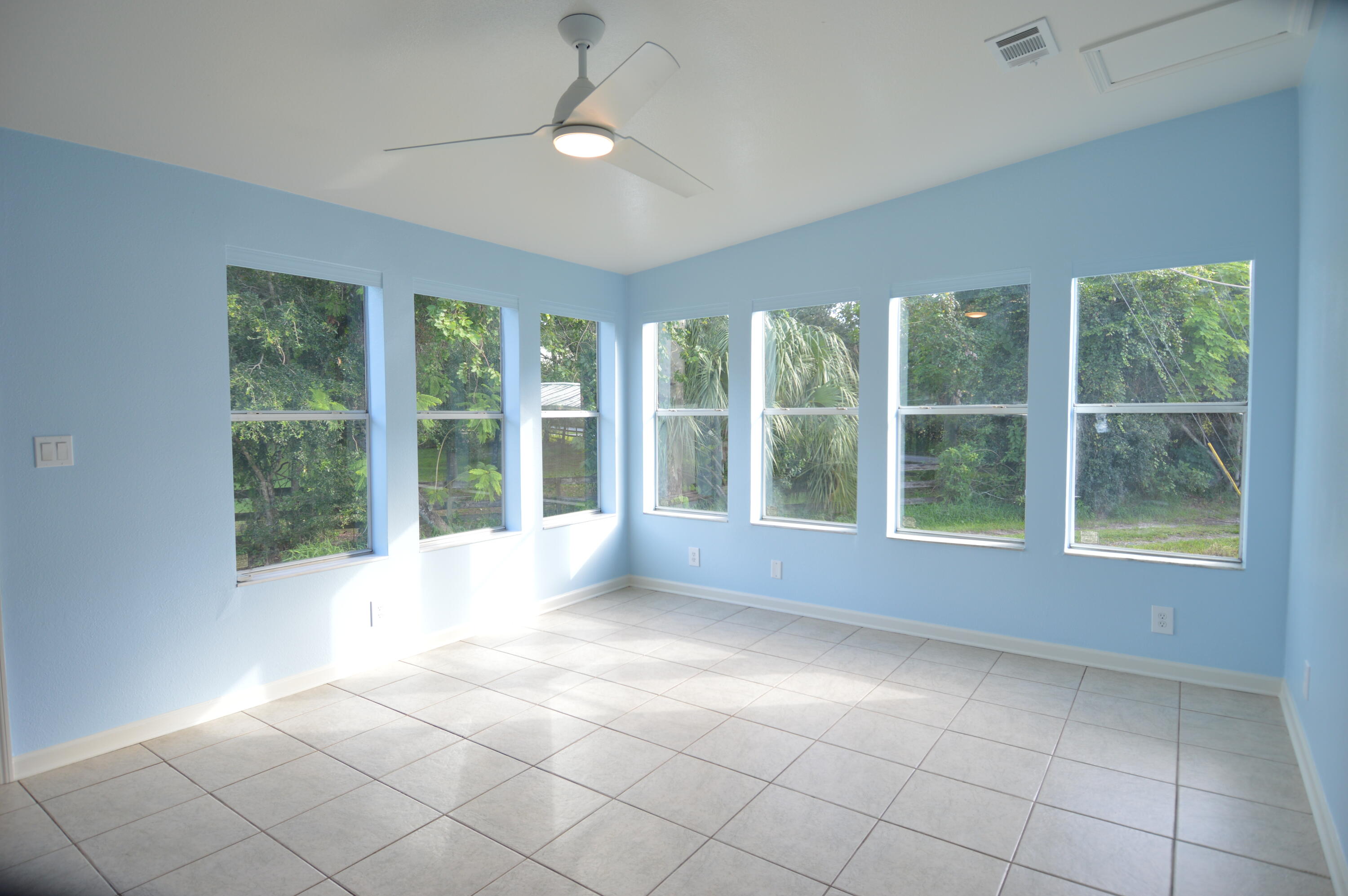 1201 Southwest Sunshine Street Stuart, FL 34997 - Photo 25 of 41 a view of an empty room with a window