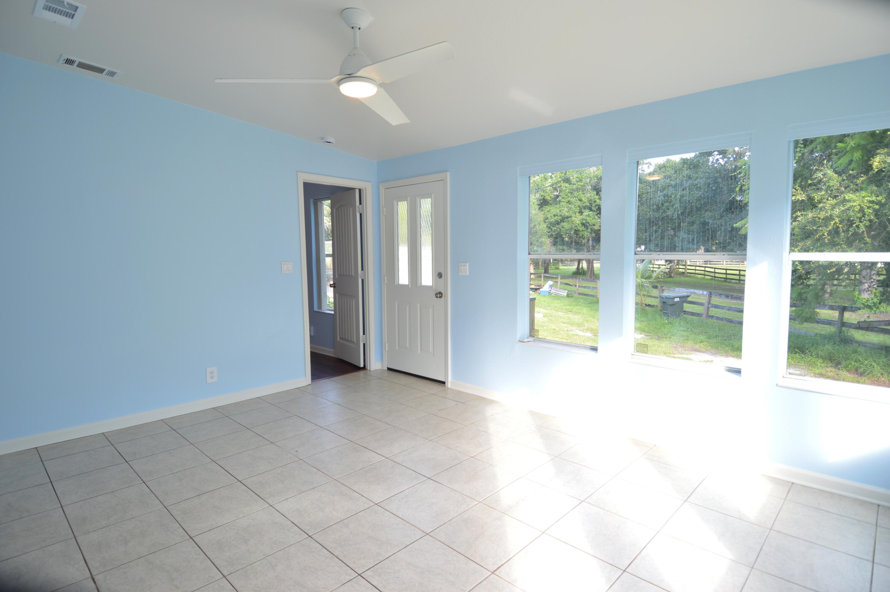 1201 Southwest Sunshine Street Stuart, FL 34997 - Photo 26 of 41 a view of an empty room with a window