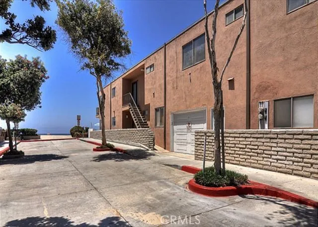 a sign board with flower plants