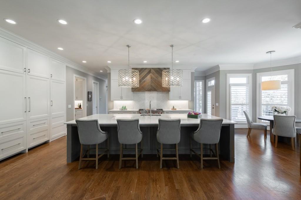 165 Autry Trail Alpharetta, GA 30022 - Photo 15 of 70 a large kitchen with a table and chairs