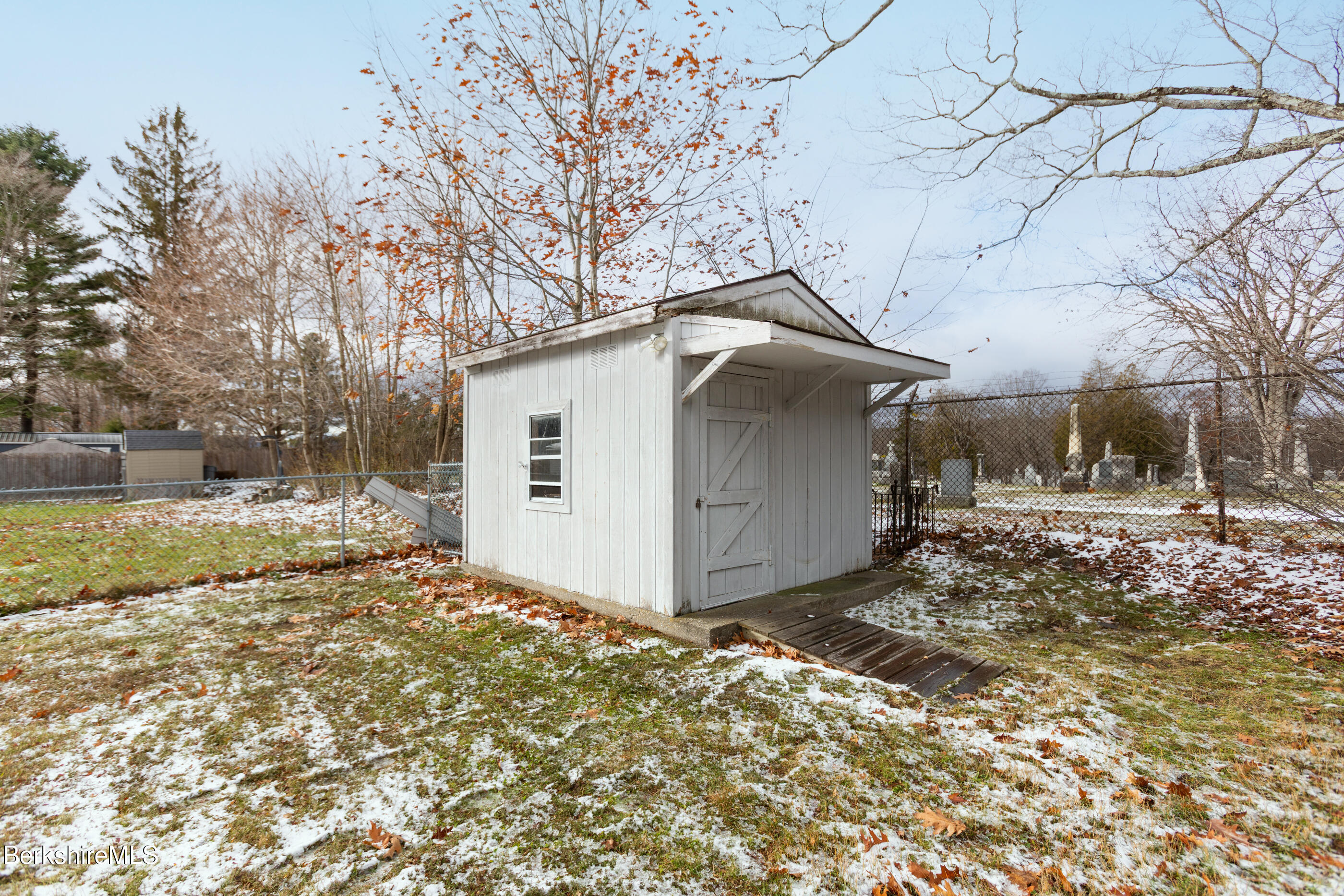 25 Robert Street Pittsfield, MA 01201 - Photo 4 of 19 a view of a house with a yard