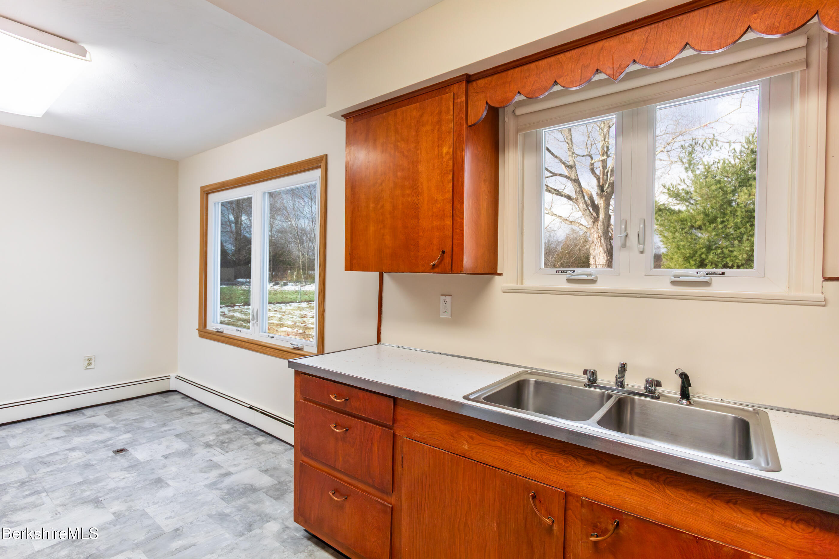 25 Robert Street Pittsfield, MA 01201 - Photo 6 of 19 a kitchen that has a sink and a window