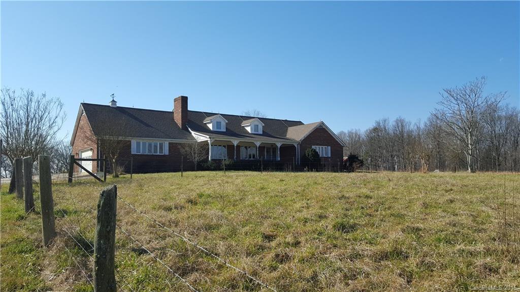 13531 Cabarrus Station Road Midland, NC 28107 - Photo 1 of 14 a front view of a house with a yard