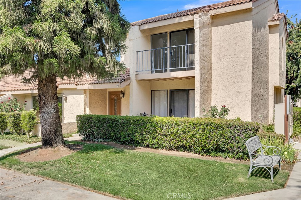 7054 Poco Senda Riverside, CA 92504 - Photo 1 of 1 front view of a house with a yard