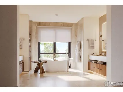 a bathroom with a tub and shower