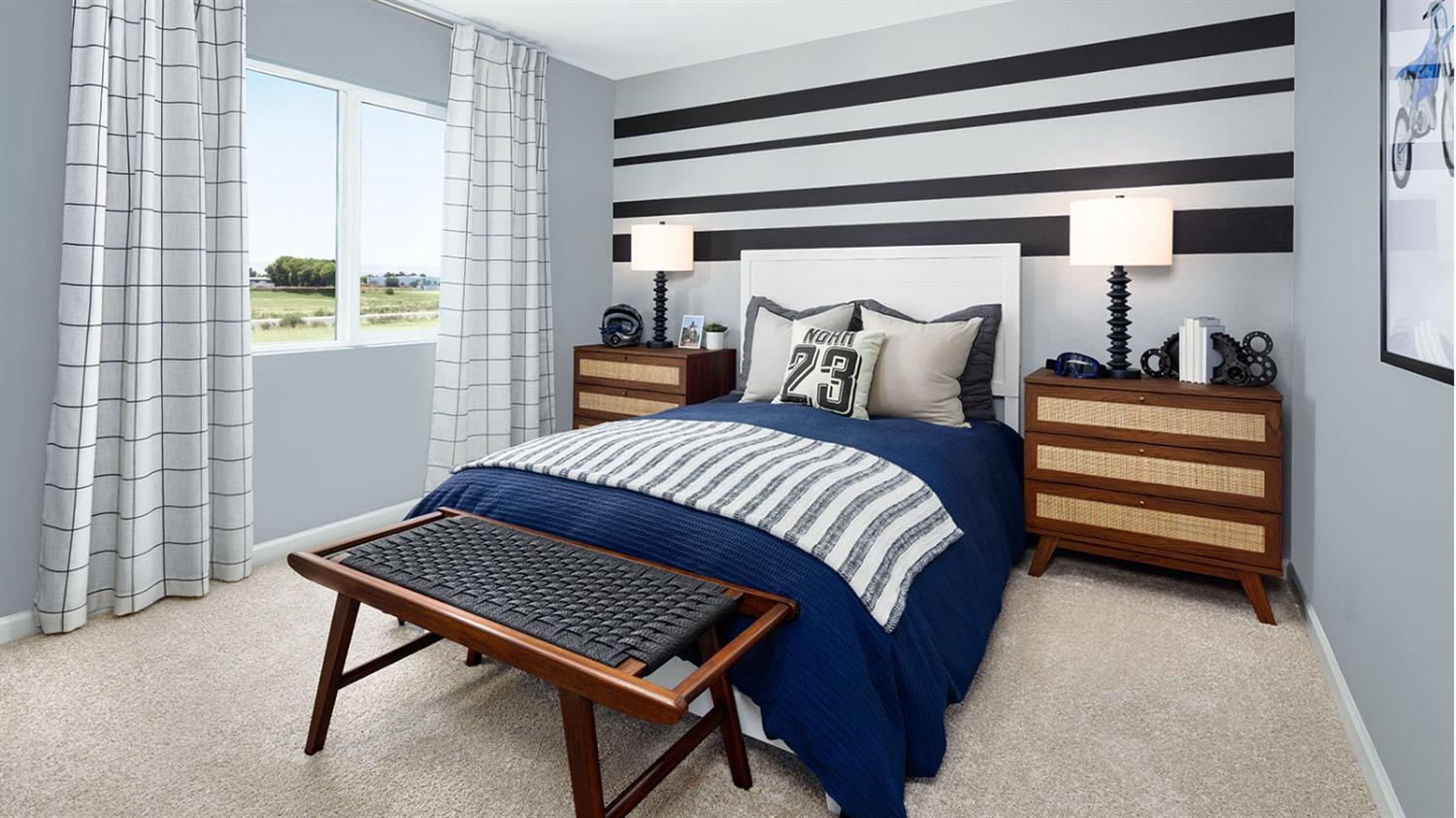 2488 Labrusca Street Manteca, CA 95337 - Photo 11 of 17 a bedroom with a bed and windows