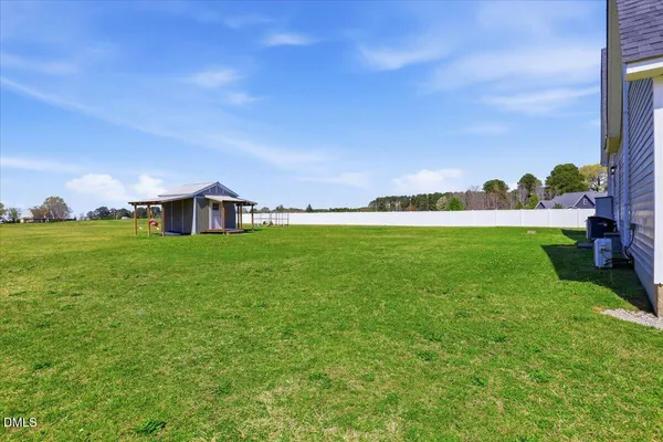 a house view with a garden space