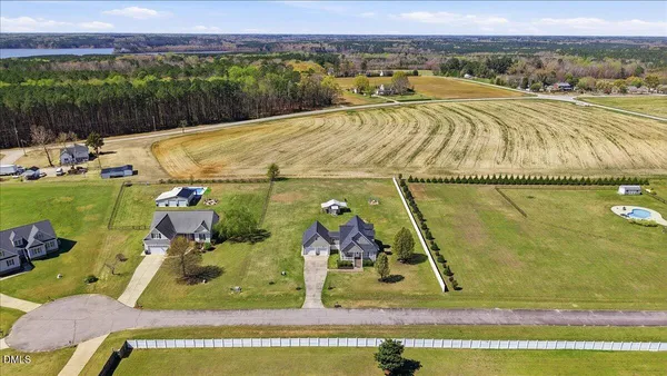 a view of a swimming pool with a lake view