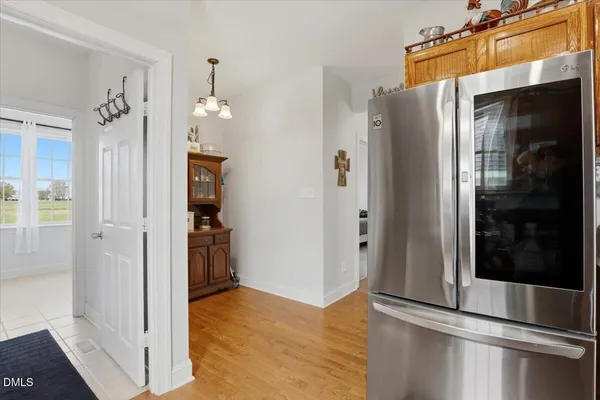 a view of a bathroom with a tub and shower