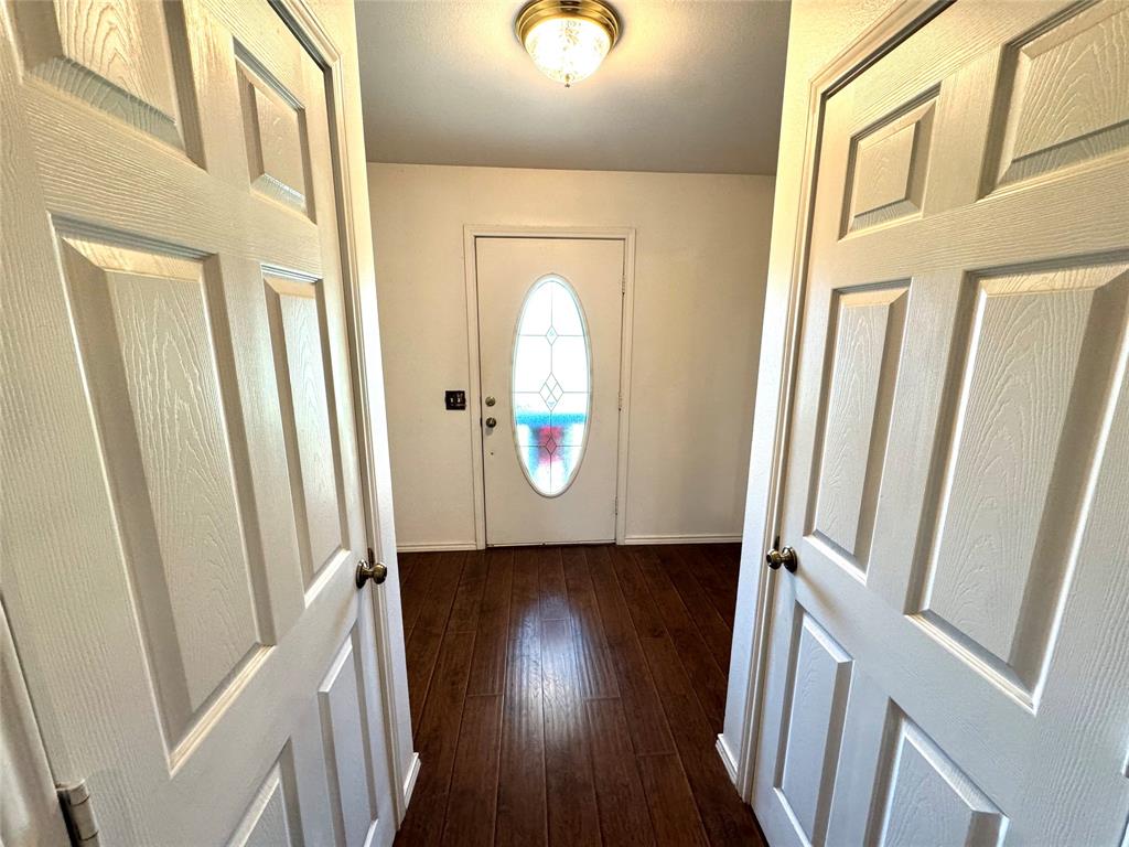 505 3rd Street Dodd City, TX 75438 - Photo 33 of 37 a view of an entryway with wooden floor