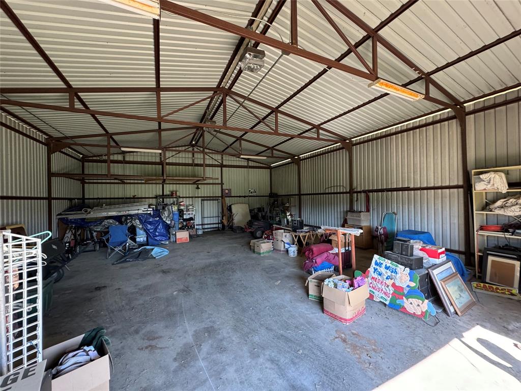 505 3rd Street Dodd City, TX 75438 - Photo 7 of 37 a view of a garage with storage