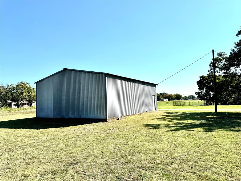 505 3rd Street Dodd City, TX 75438 - Photo 8 of 37 a view of a backyard of the house