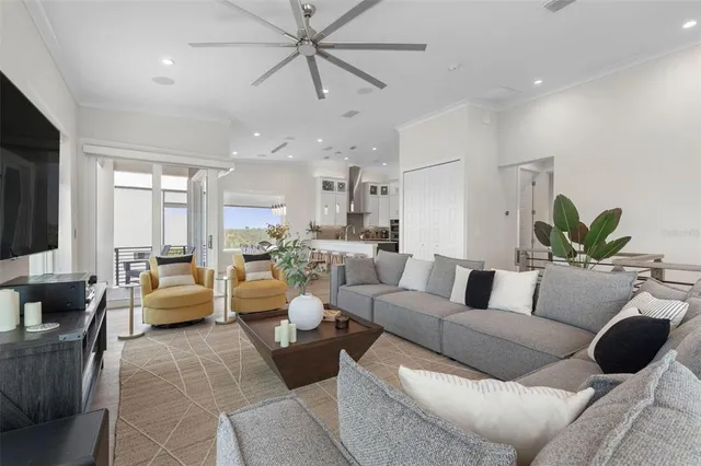 a kitchen with stainless steel appliances granite countertop a refrigerator sink and stove