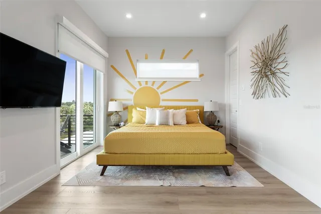 a bathroom with a granite countertop shower and toilet