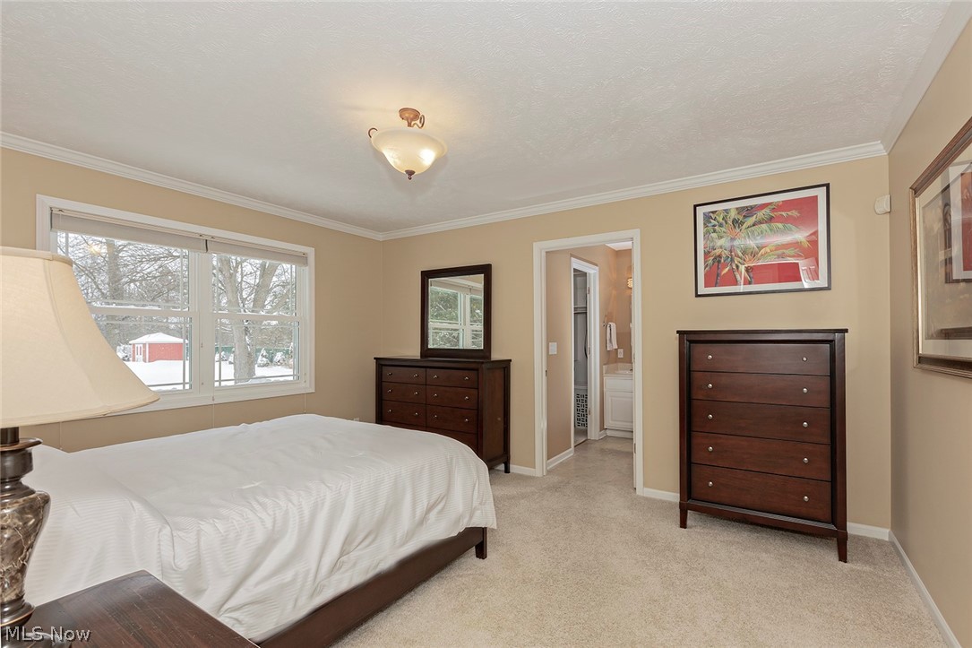 5420 Bartlett Road Bedford, OH 44146 - Photo 11 of 32 Owner's suite. Features an en-suite bathroom and walk-in closet.