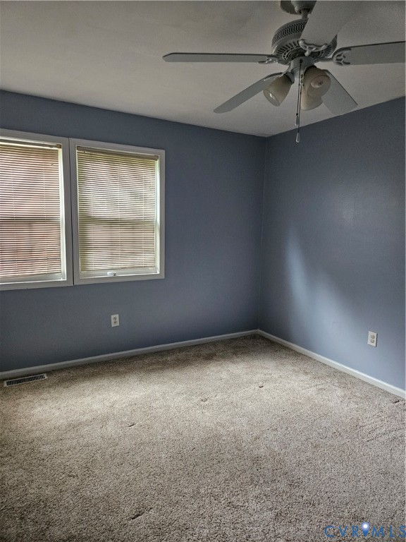 107 Tudor Road Colonial Heights, VA 23834 - Photo 6 of 13 Room featuring gray walls, light gray carpeting, a