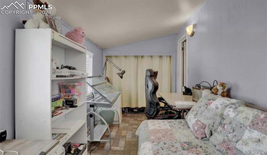 24119 Eccles Street Elbert, CO 80106 - Photo 18 of 23 a view of a room with gym equipment