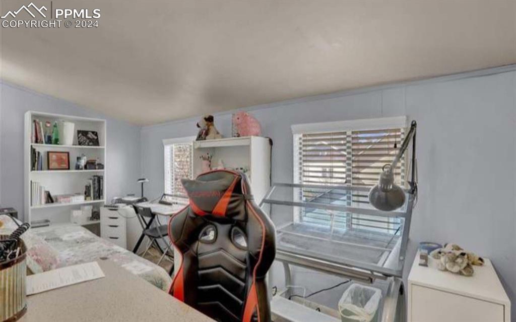 24119 Eccles Street Elbert, CO 80106 - Photo 19 of 23 a view of a livingroom with furniture and workspace