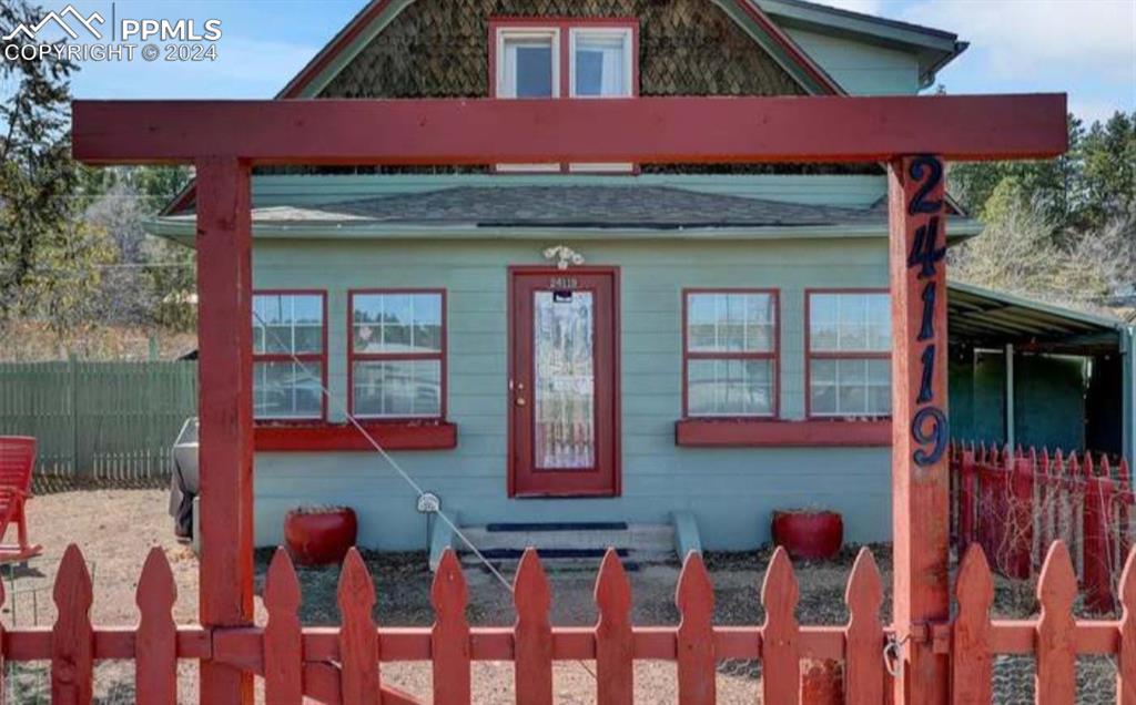 24119 Eccles Street Elbert, CO 80106 - Photo 2 of 23 a front view of a house with glass windows