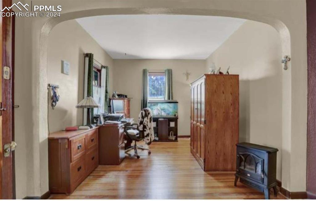 24119 Eccles Street Elbert, CO 80106 - Photo 4 of 23 a view of a livingroom with furniture and hardwood floor