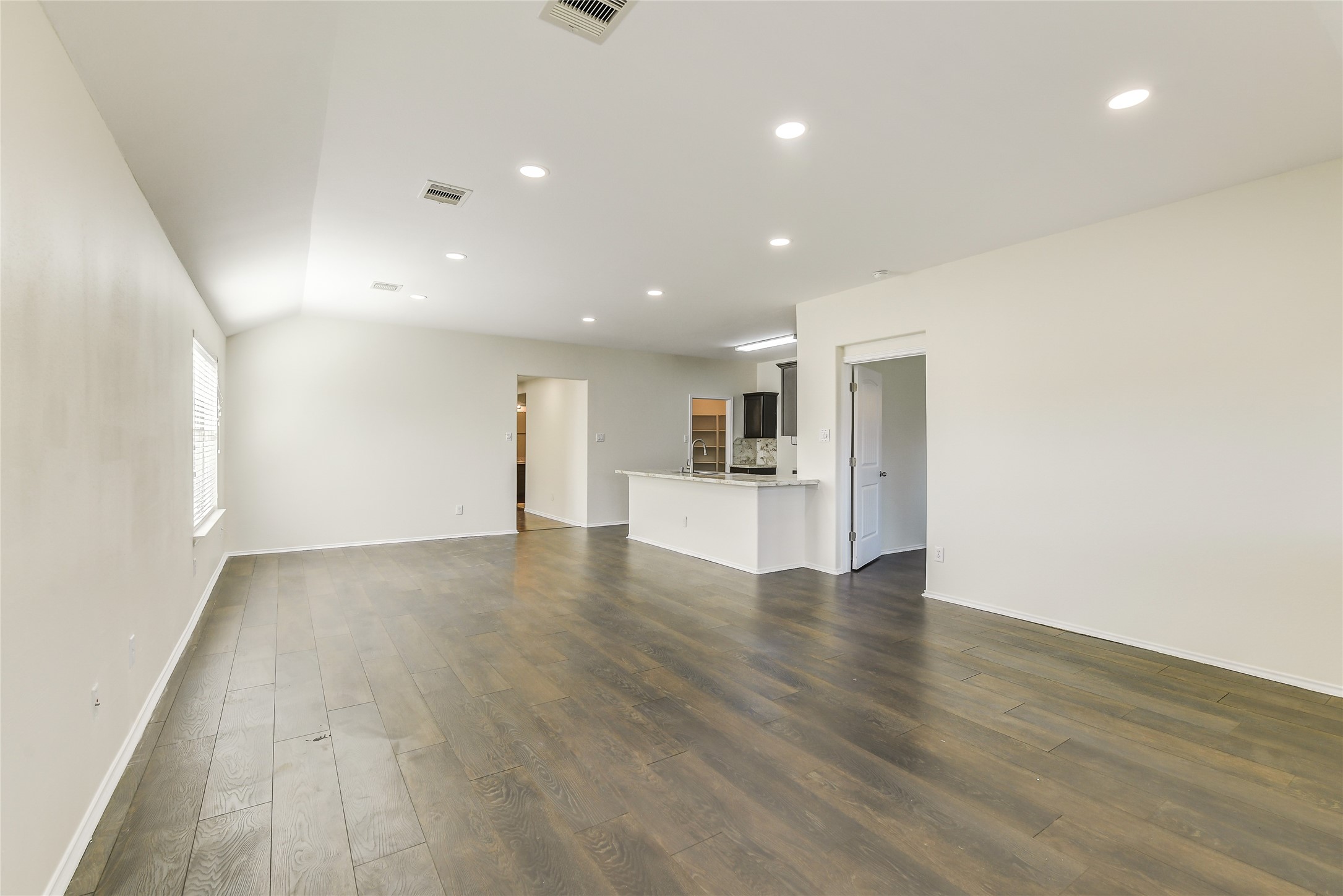 2023 Louetta Mist Drive Spring, TX 77388 - Photo 11 of 39 a view of empty room with wooden floor