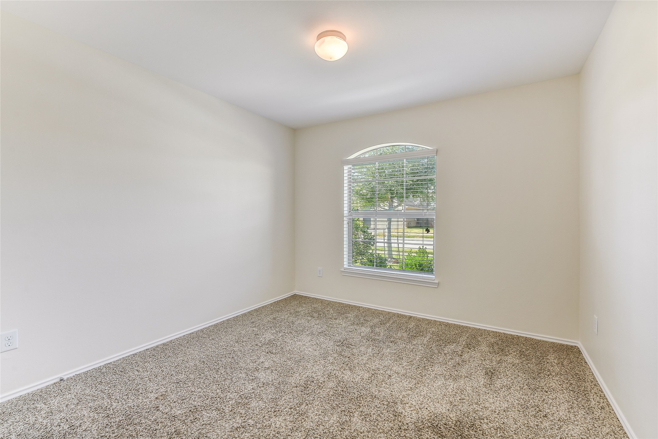 2023 Louetta Mist Drive Spring, TX 77388 - Photo 24 of 39 an empty room with a window