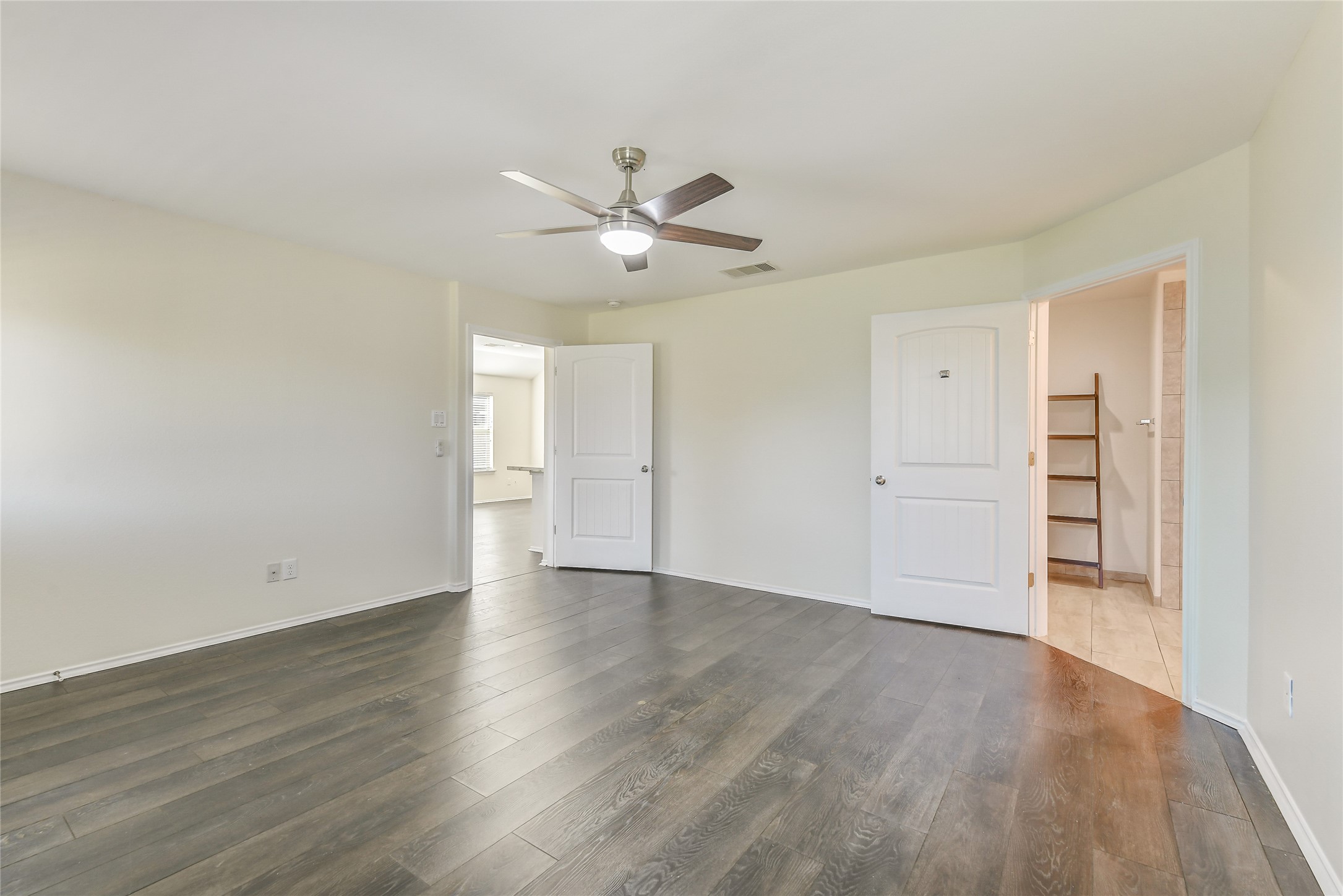 2023 Louetta Mist Drive Spring, TX 77388 - Photo 27 of 39 wooden floor in an empty room
