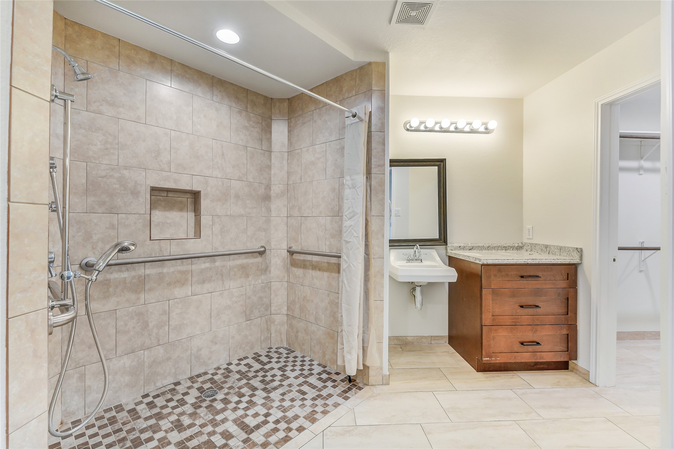 2023 Louetta Mist Drive Spring, TX 77388 - Photo 32 of 39 a bathroom with a shower and a sink
