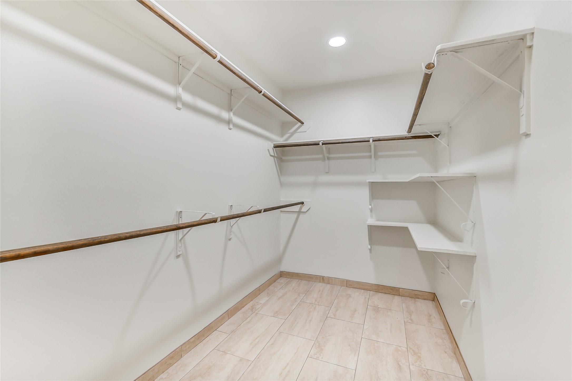 2023 Louetta Mist Drive Spring, TX 77388 - Photo 33 of 39 a view of an empty walk in closet