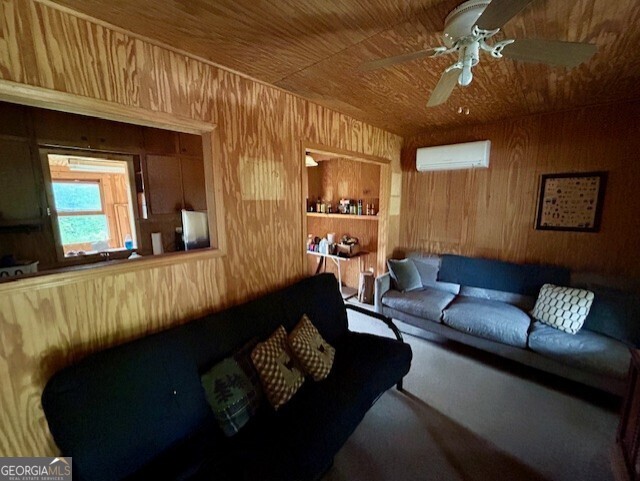 289 Hunting Club Road Southwest Crawfordville, GA 30631 - Photo 12 of 23 a living room with furniture and a window