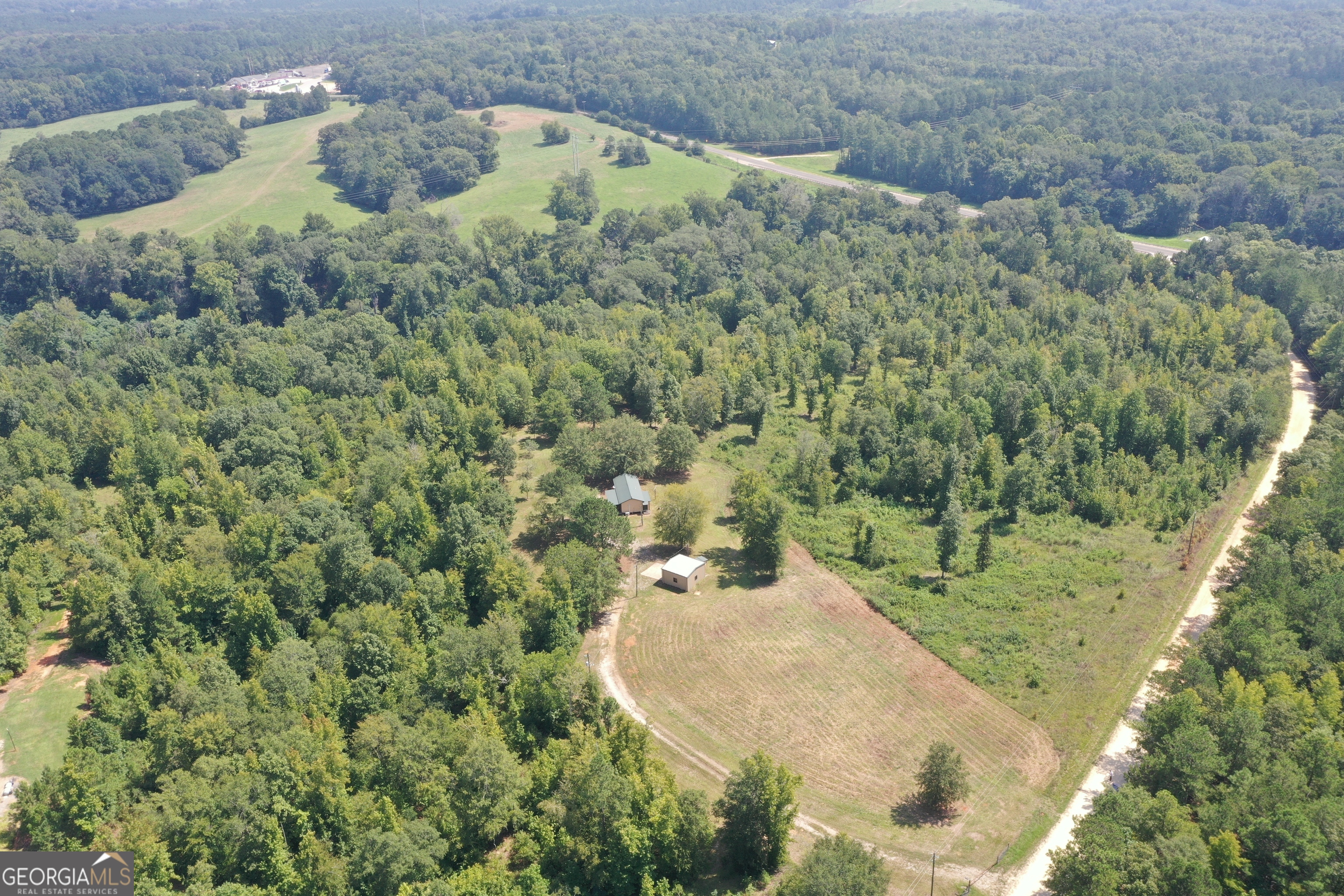 289 Hunting Club Road Southwest Crawfordville, GA 30631 - Photo 20 of 23 a view of a yard with a sink