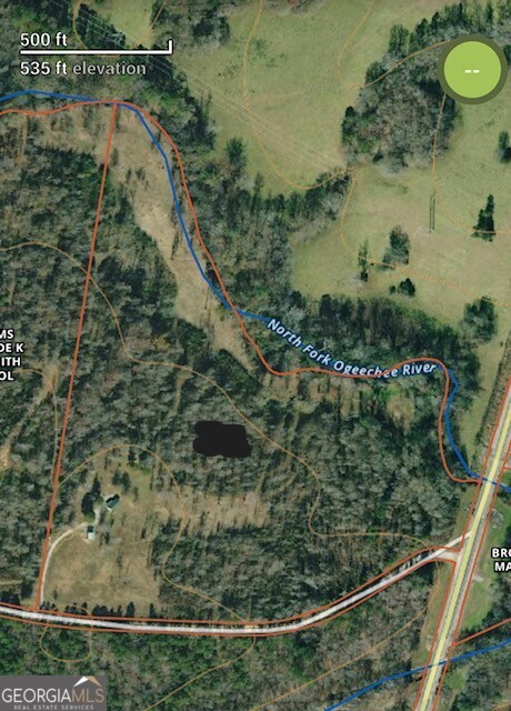 289 Hunting Club Road Southwest Crawfordville, GA 30631 - Photo 22 of 23 a view of a lake