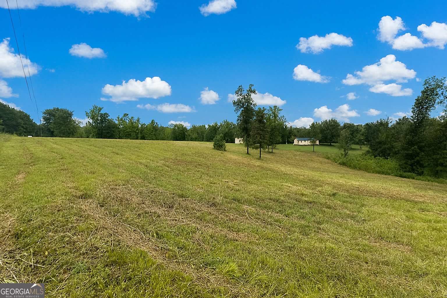 289 Hunting Club Road Southwest Crawfordville, GA 30631 - Photo 3 of 23 a view of an ocean and a yard