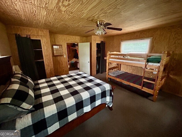 289 Hunting Club Road Southwest Crawfordville, GA 30631 - Photo 10 of 23 a bedroom with a bed and cabinets