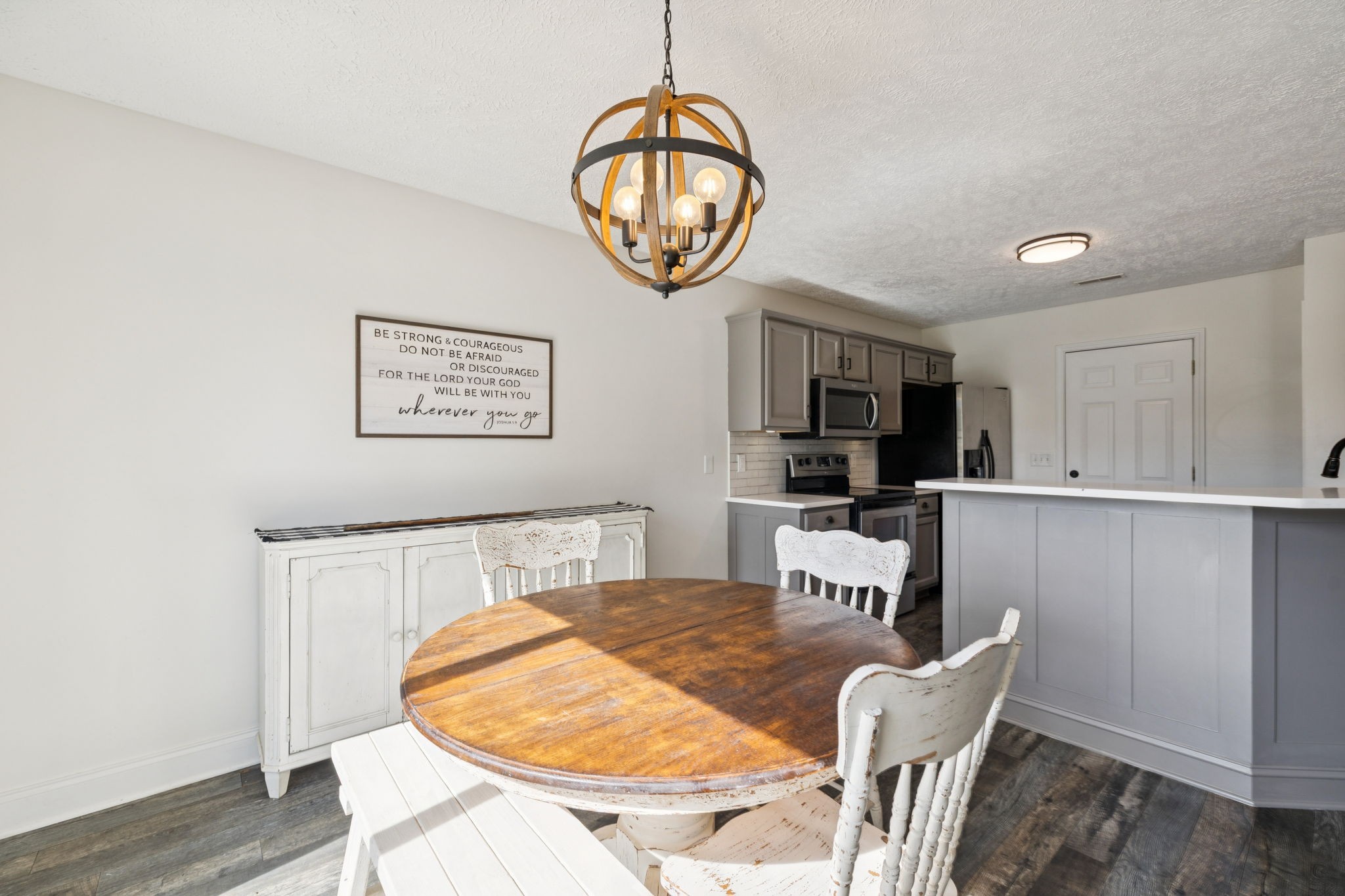 1169 Mantle Way Murfreesboro, TN 37129 - Photo 12 of 45 a view of dining room with wooden floor and white cabinet