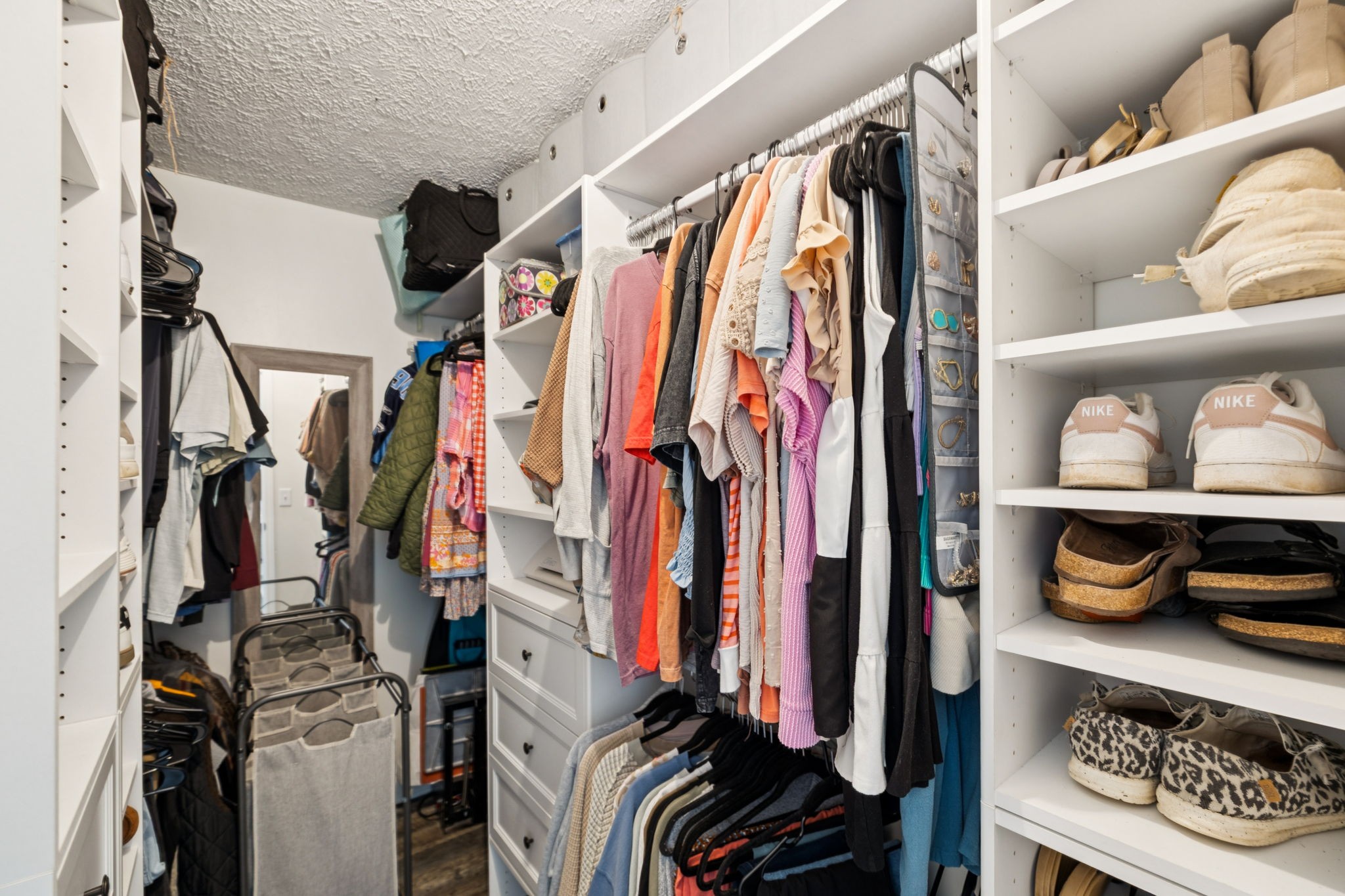 1169 Mantle Way Murfreesboro, TN 37129 - Photo 29 of 45 a view of walk in closet with clothes and shoes