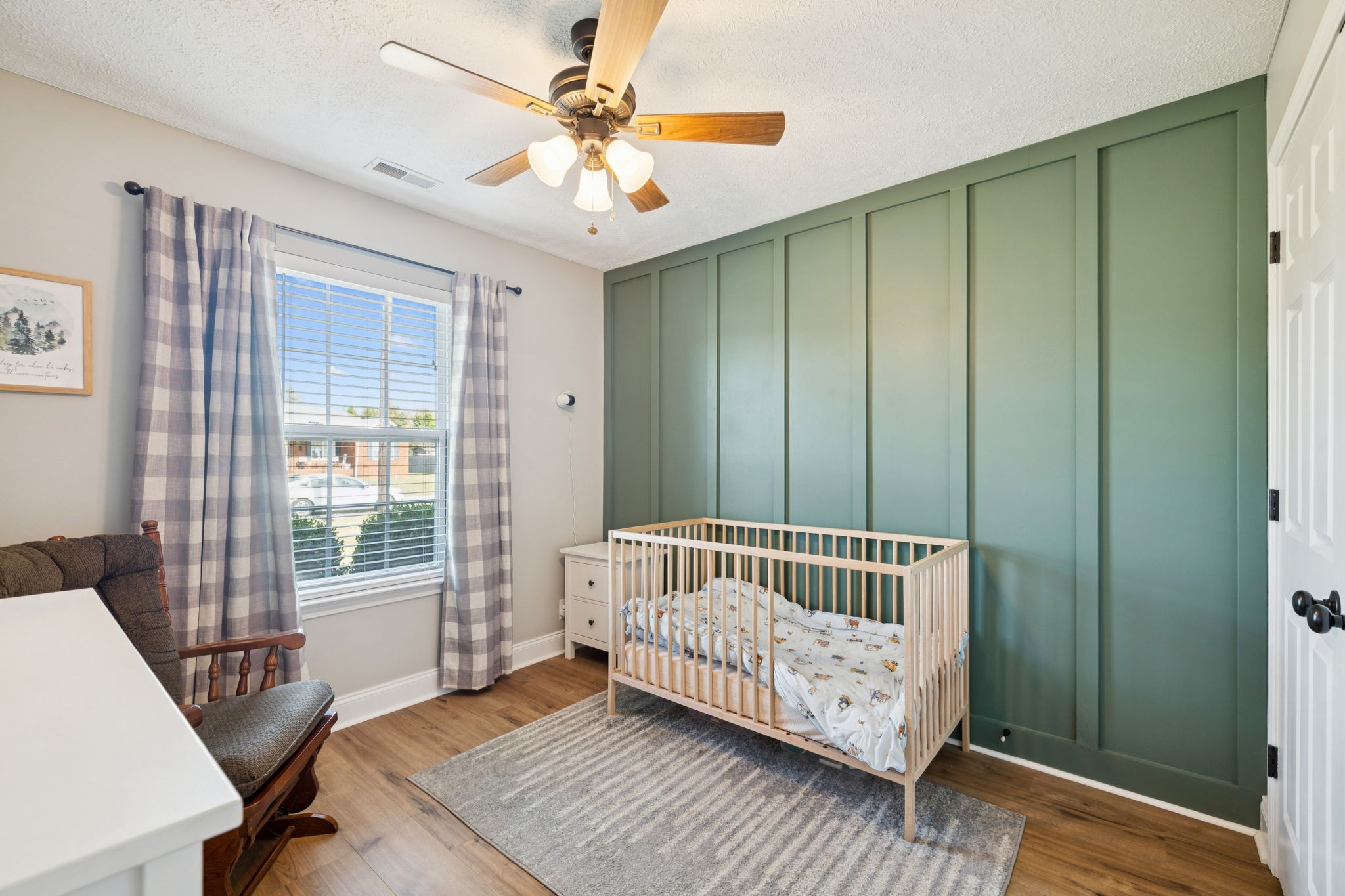 1169 Mantle Way Murfreesboro, TN 37129 - Photo 31 of 45 a view of a bedroom with wooden floor and windows