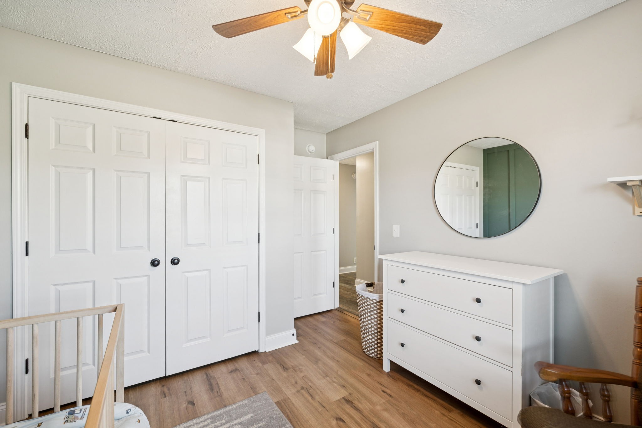 1169 Mantle Way Murfreesboro, TN 37129 - Photo 32 of 45 a view of a bedroom with wooden floor cabinet and a mirror