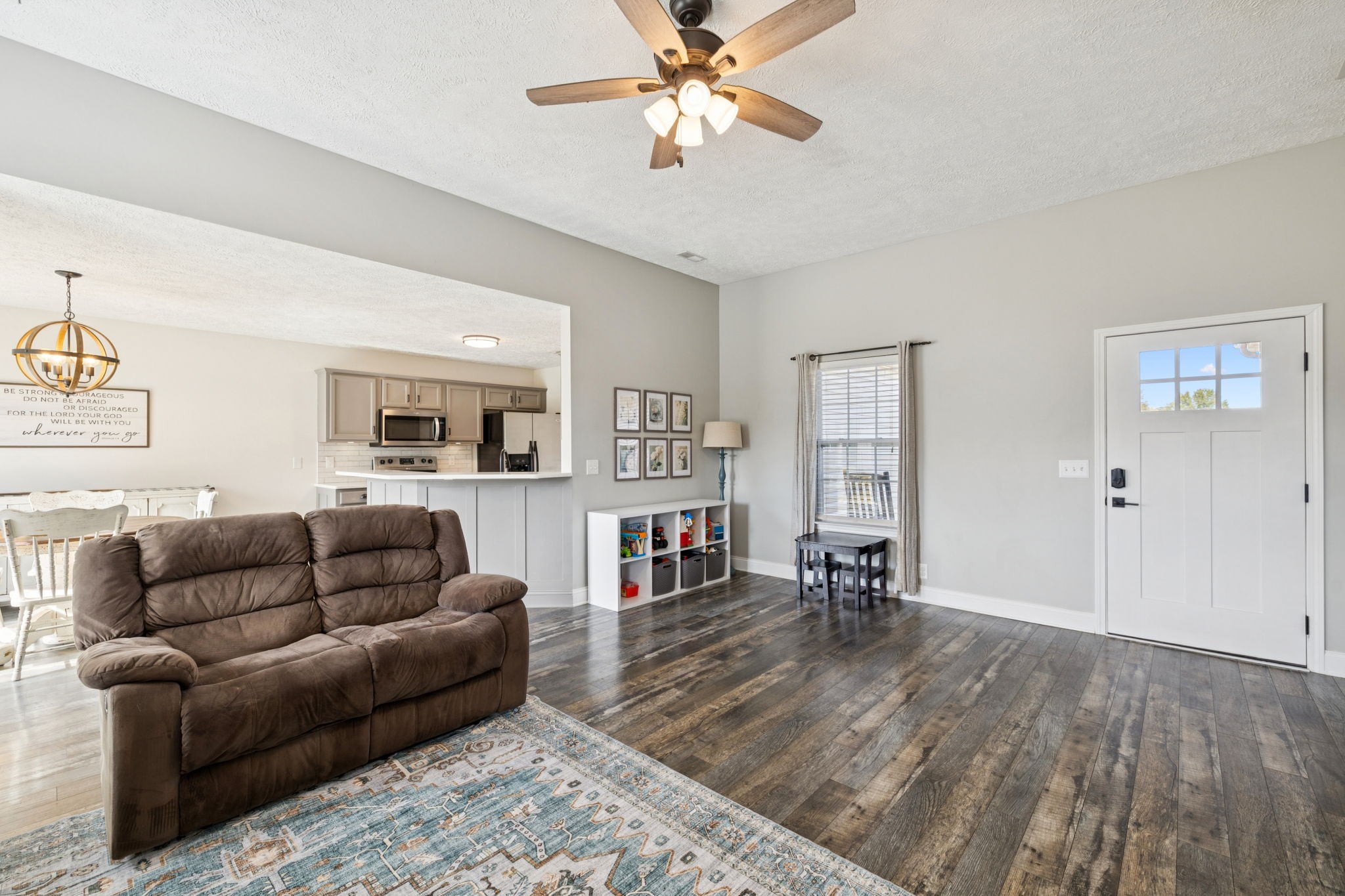 1169 Mantle Way Murfreesboro, TN 37129 - Photo 7 of 45 a living room with furniture and kitchen view
