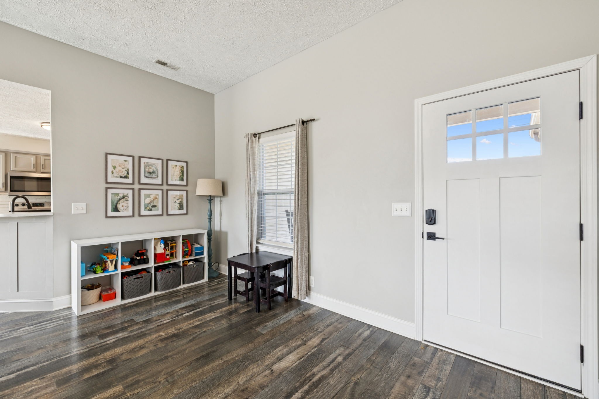 1169 Mantle Way Murfreesboro, TN 37129 - Photo 8 of 45 a living room with furniture and a wooden floor