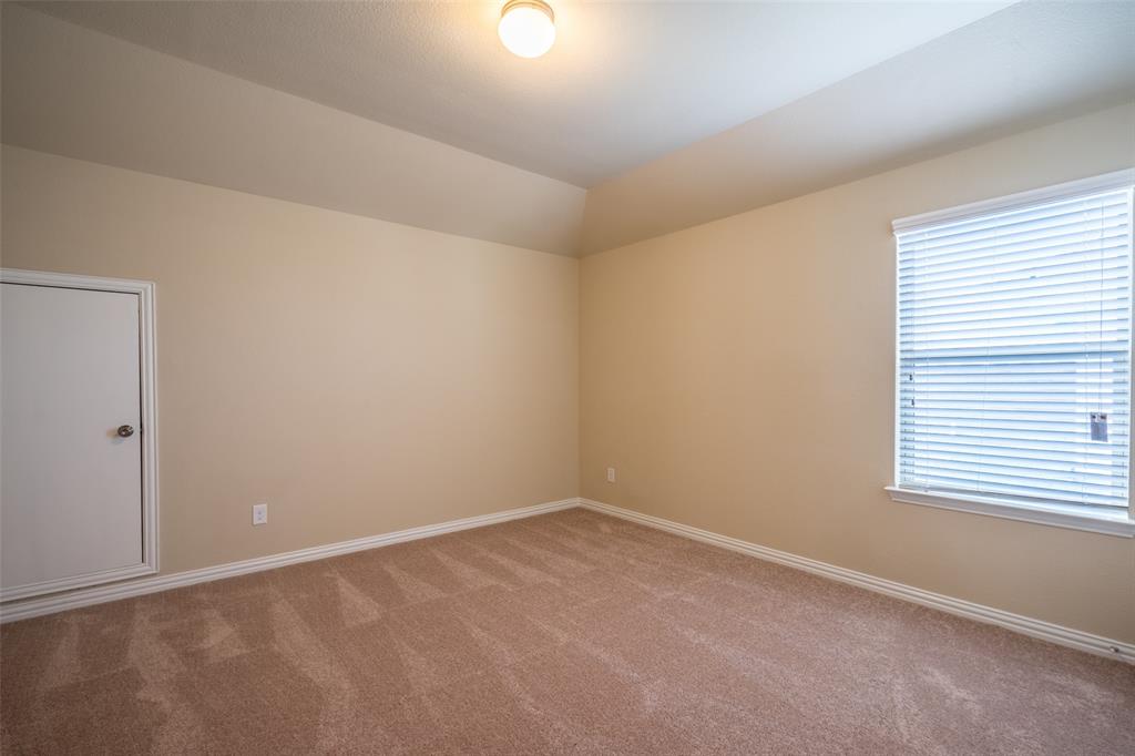 2401 Austin Lane Prosper, TX 75078 - Photo 33 of 36 Unfurnished room with carpet and vaulted ceiling