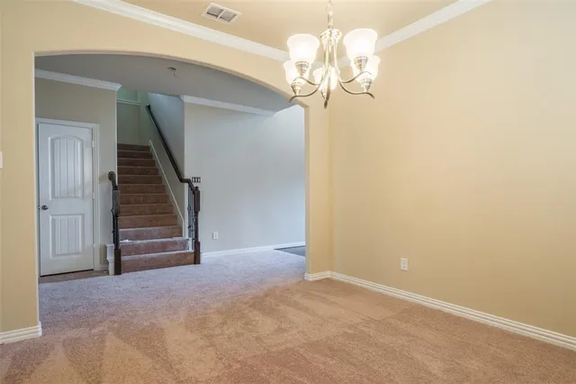 a view of a chandelier in a room