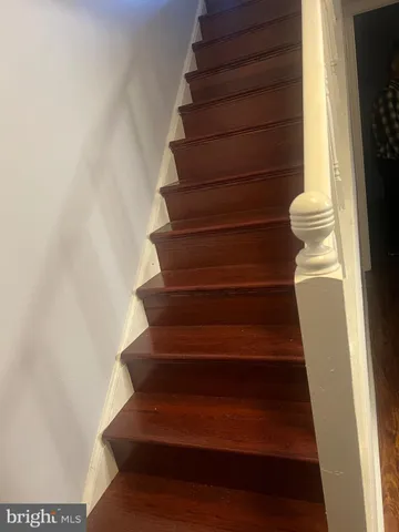 a bathroom with a shower and toilet