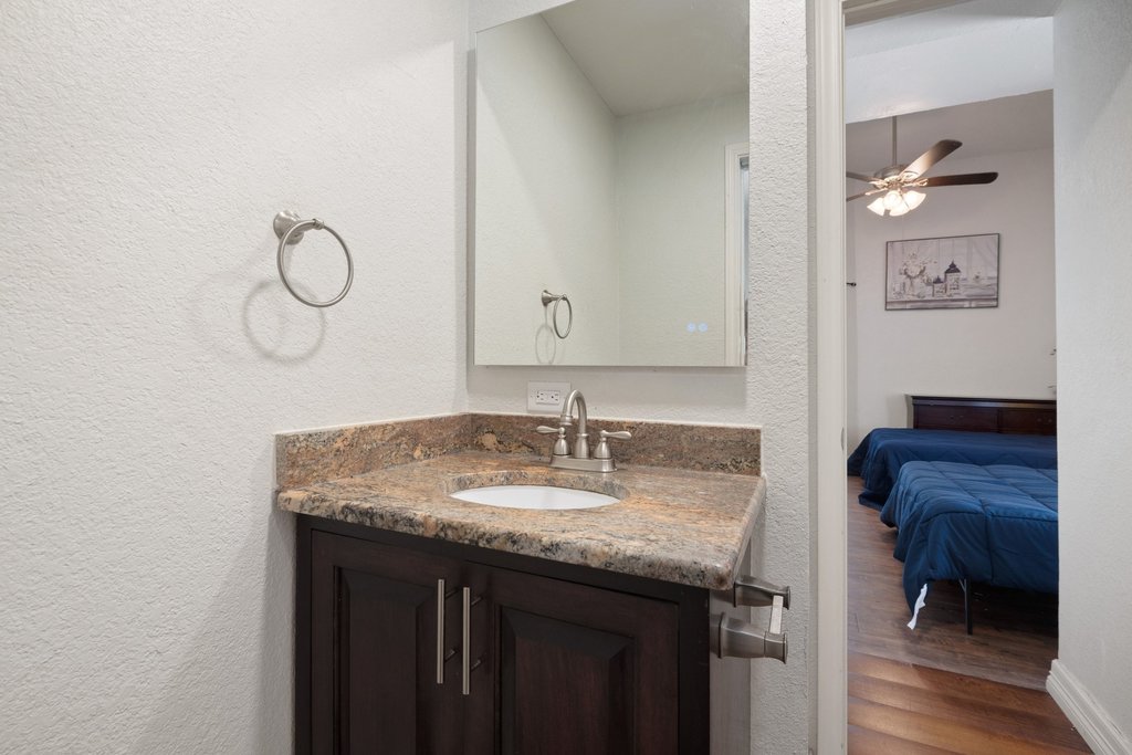 1910 Robbins Place, Unit 106 Austin, TX 78705 - Photo 10 of 20 a sink with a vanity